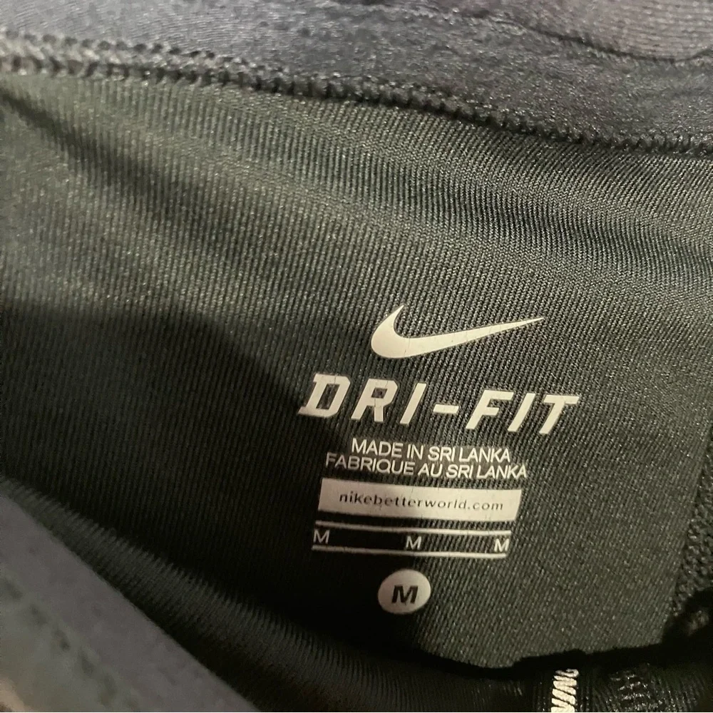 Nike dri-fit running‎ pants below knee black size medium